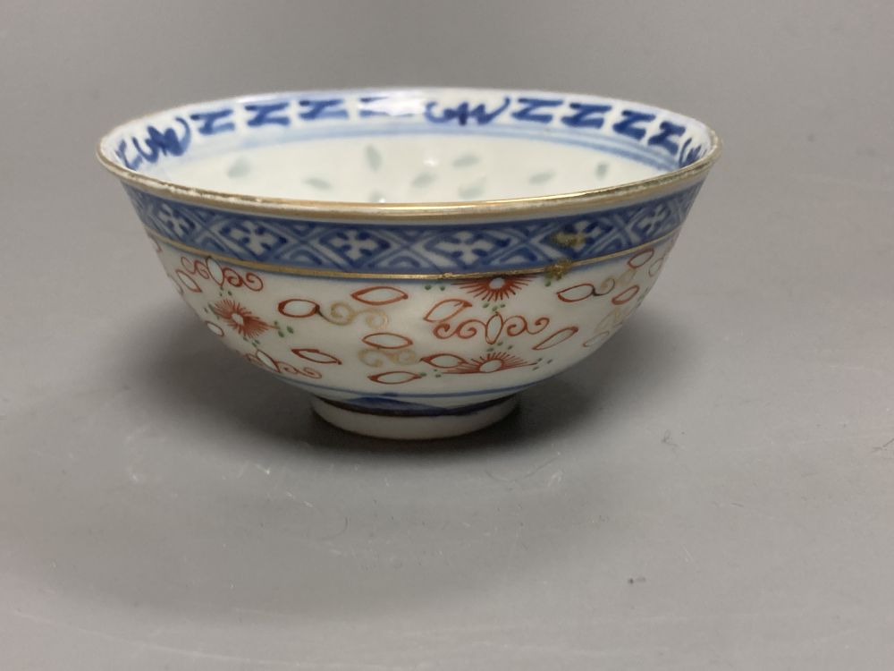 An 18th century English blue and white tea bowl and three smaller Chinese ceramic cups, two marks